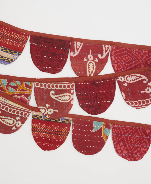 In hues of red, this cotton garland is a perfect ecofriendly decoration 