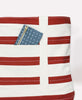 Classic red and white striped large tote bag shown with open pocket and contrasting green coin purse
