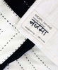 Eco-friendly cotton throw featuring the hand-stitched name on the tag by the artisan maker