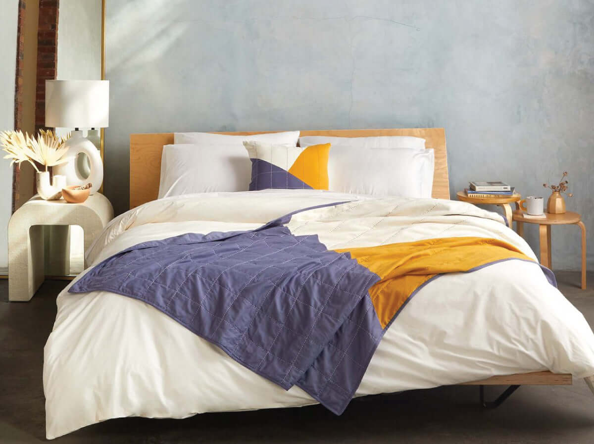 Brooklinen x Anchal Project collaboration featuring queen and king quilted bedding