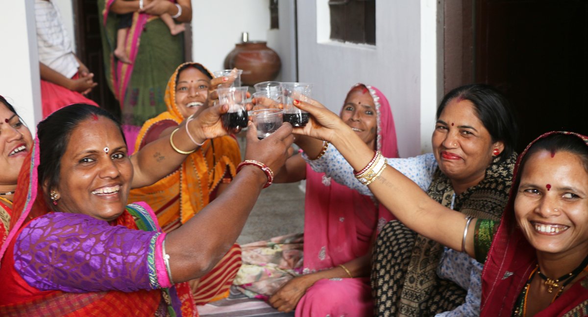 Some of Anchal's artisans celebrating the arrival of the Anchal team by welcoming them into their own homes