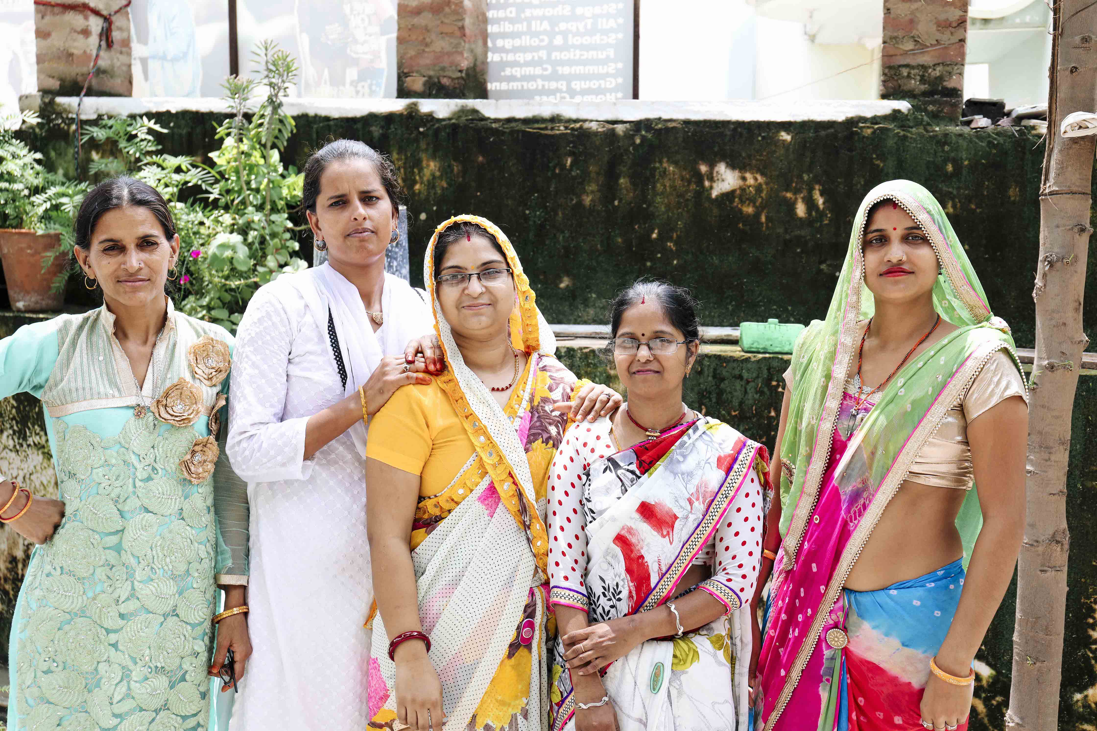 Anchal artisans gathered together smiling and empowered. 