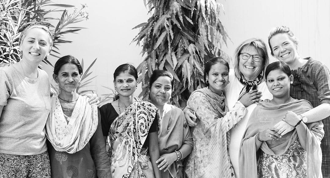 Colleen and Maggie Clines gathered together with some of Anchal's artisans from their last trip to India