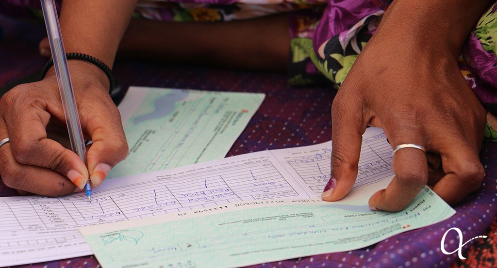 Anchal artisan doing financial work at an educational workshop made possible by the grant from Circle of Sisterhood