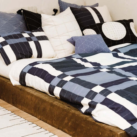 Contemporary fair trade quilt bedding made with organic cotton for sustainable home decor