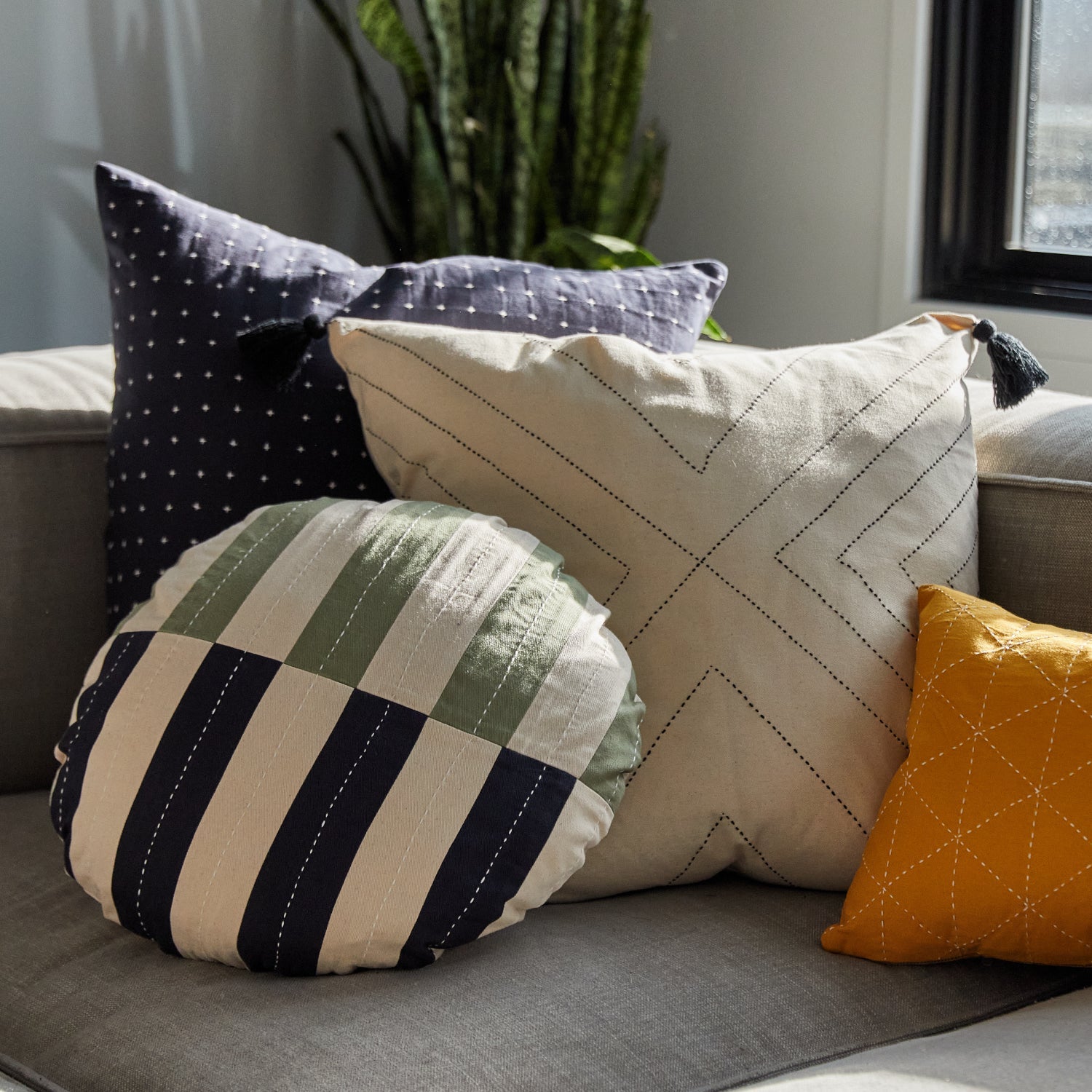 striped round pillow pm grey sofa with other sustainable modern throw pillows