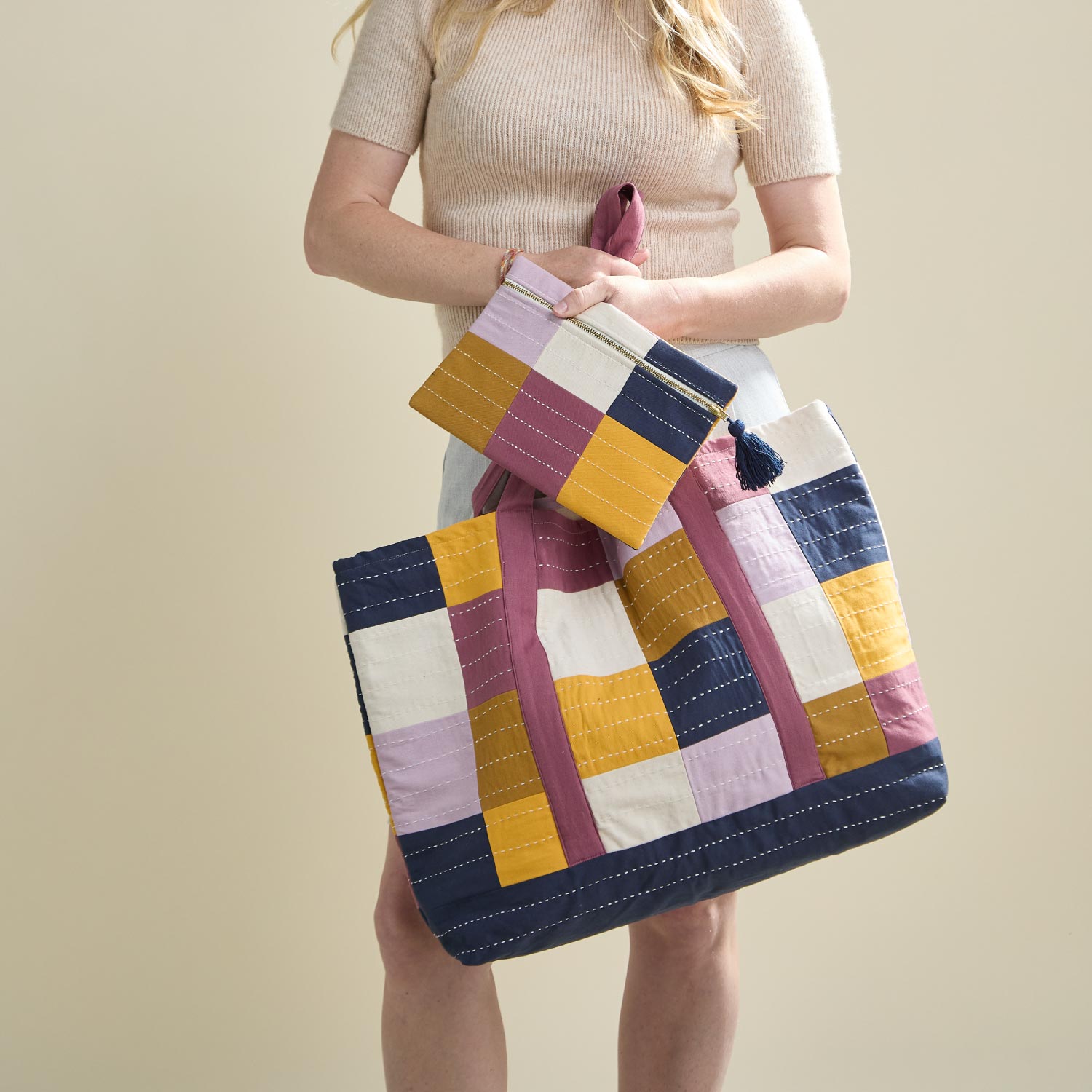 checkered tote bag and matching checkered pouch in shades of lilac purple and navy blue