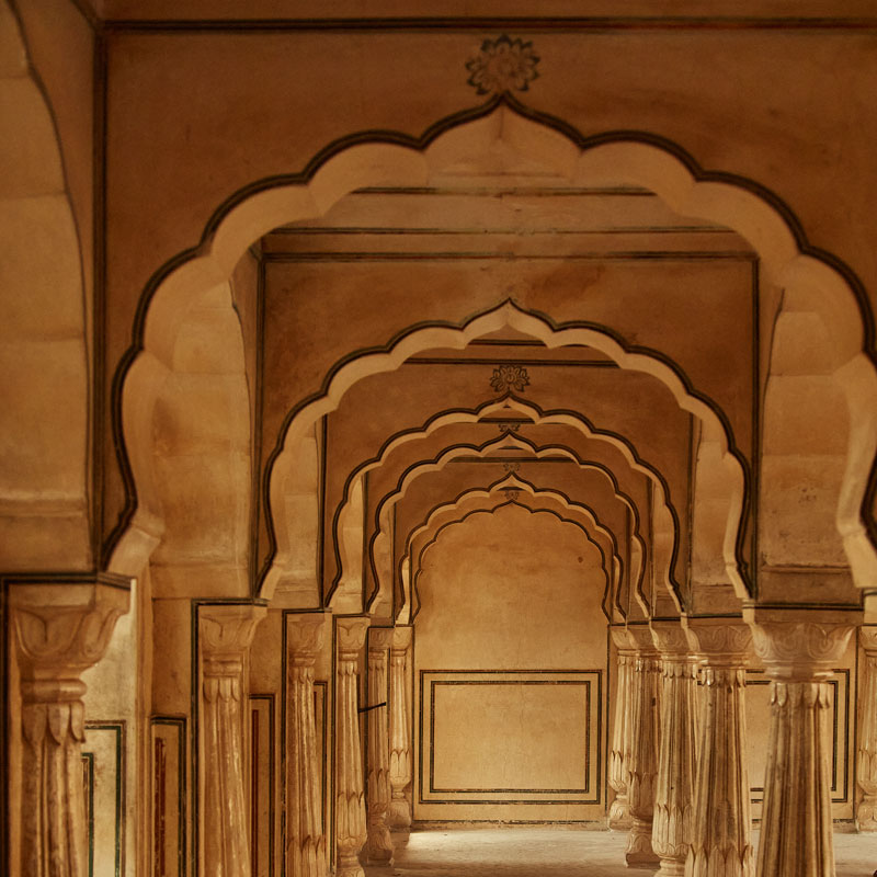 Rambagh Palace in Jaipur, India featuring beautiful archways & columns