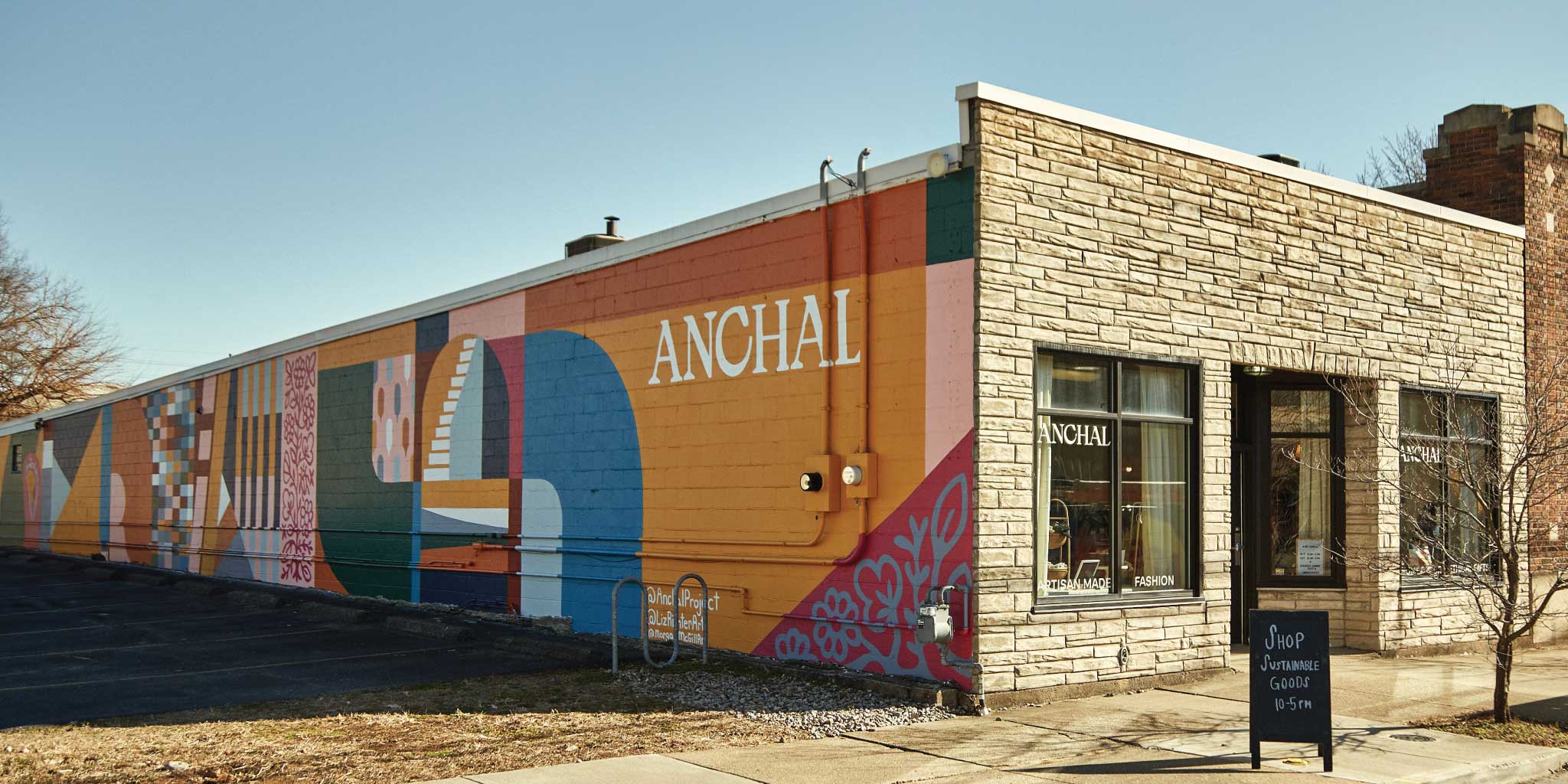 Anchal's first retail store in Louisville, KY featuring a bright & modern wall mural on the building's side