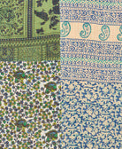 kantha quilt throw with a tag featuring the hand-stitched signature of the maker
