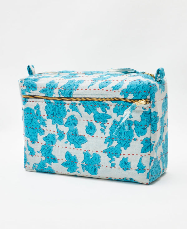 One-of-a-kind blue and white floral vintage kantha toiletry bag made
using recycled cotton saris