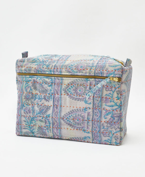 One-of-a-kind pastel blue paisleykantha toiletry bag made
using recycled cotton saris