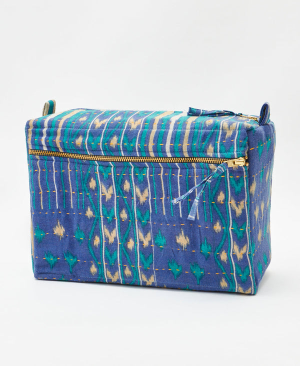 One-of-a-kind blue geometric floral kantha toiletry bag made
using recycled cotton saris