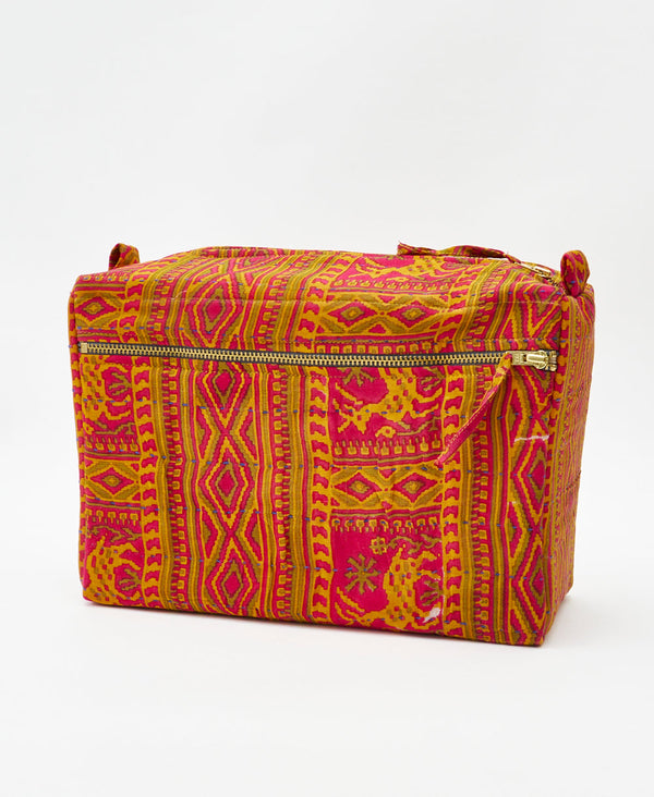 One-of-a-kind pink abstract kantha toiletry bag made
using recycled cotton saris
