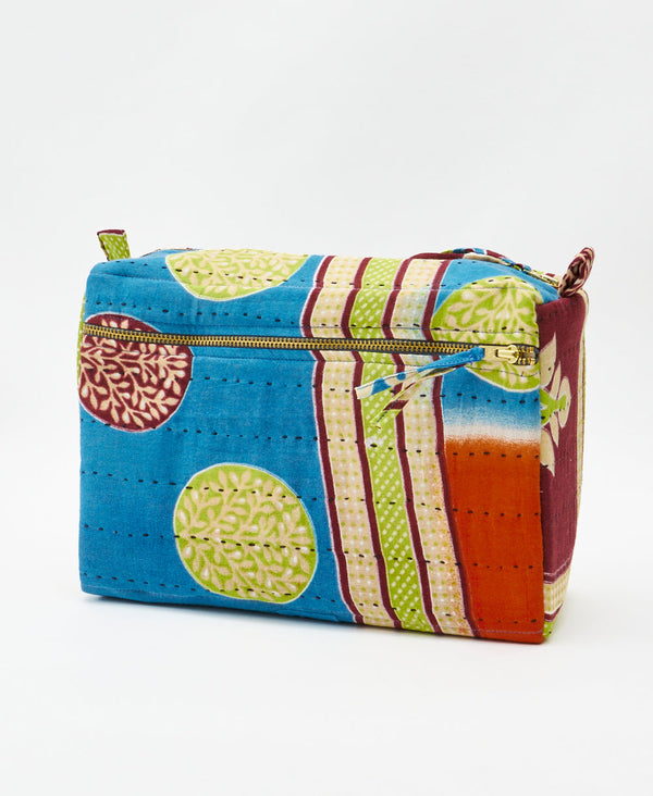 One-of-a-kind blue striped geometric kantha toiletry bag made
using recycled cotton saris