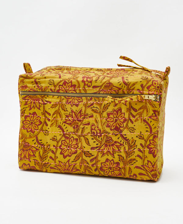 One-of-a-kind neutral floral geometric kantha toiletry bag made
using recycled cotton saris