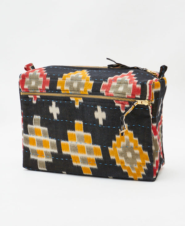 One-of-a-kind black geometric kantha toiletry bag made
using recycled cotton saris