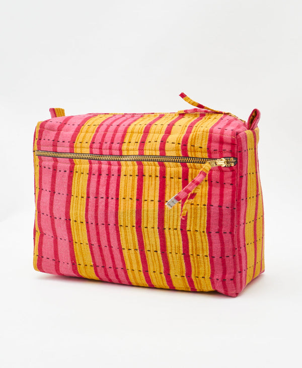 One-of-a-kind pink and yellow striped kantha toiletry bag made
using recycled cotton saris