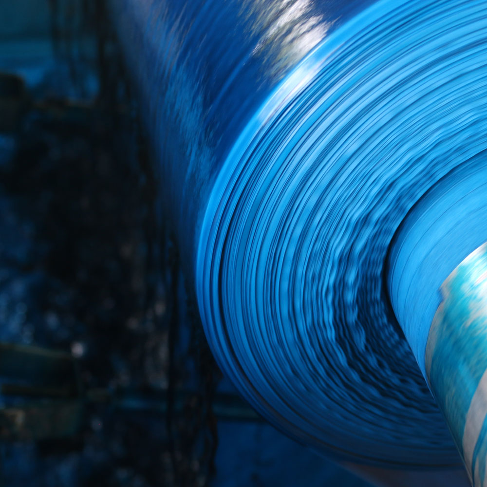 close up of a roll of royal blue fabric dyed with AZO-free and non-toxic dyes