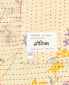 small kantha blanketwith signature of the maker on the tag