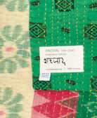 small kantha blanketwith signature of the maker on the tag