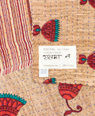 small kantha blanketwith signature of the maker on the tag