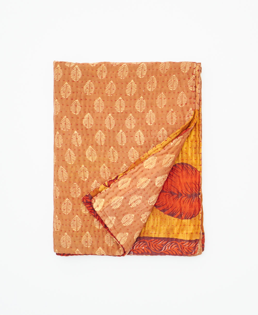 small kantha quilt handmade in India by women artisans from vintage cotton saris