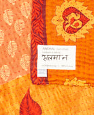 small kantha blanketwith signature of the maker on the tag