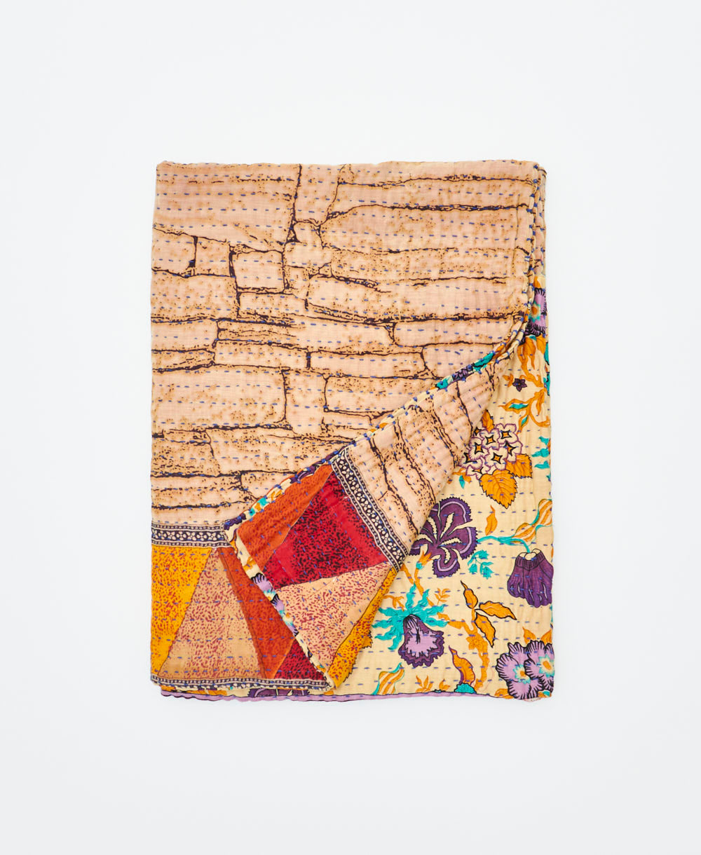 small kantha quilt handmade in India by women artisans from vintage cotton saris