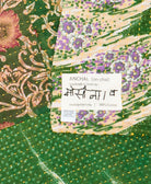 small kantha blanketwith signature of the maker on the tag