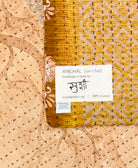 small kantha blanket with signature of the maker on the tag