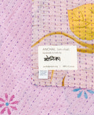 small kantha blanket with signature of the maker on the tag