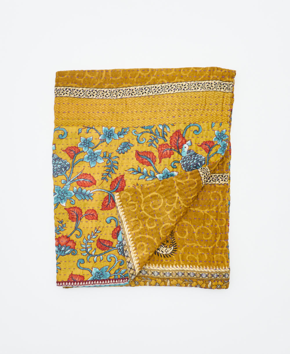 small kantha quilt handmade in India by women artisans from vintage cotton saris