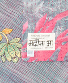 small kantha blanket with signature of the maker on the tag