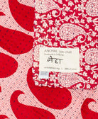 small kantha blanket with signature of the maker on the tag