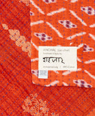 small kantha blanket with signature of the maker on the tag
