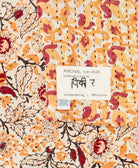 small kantha blanket with signature of the maker on the tag