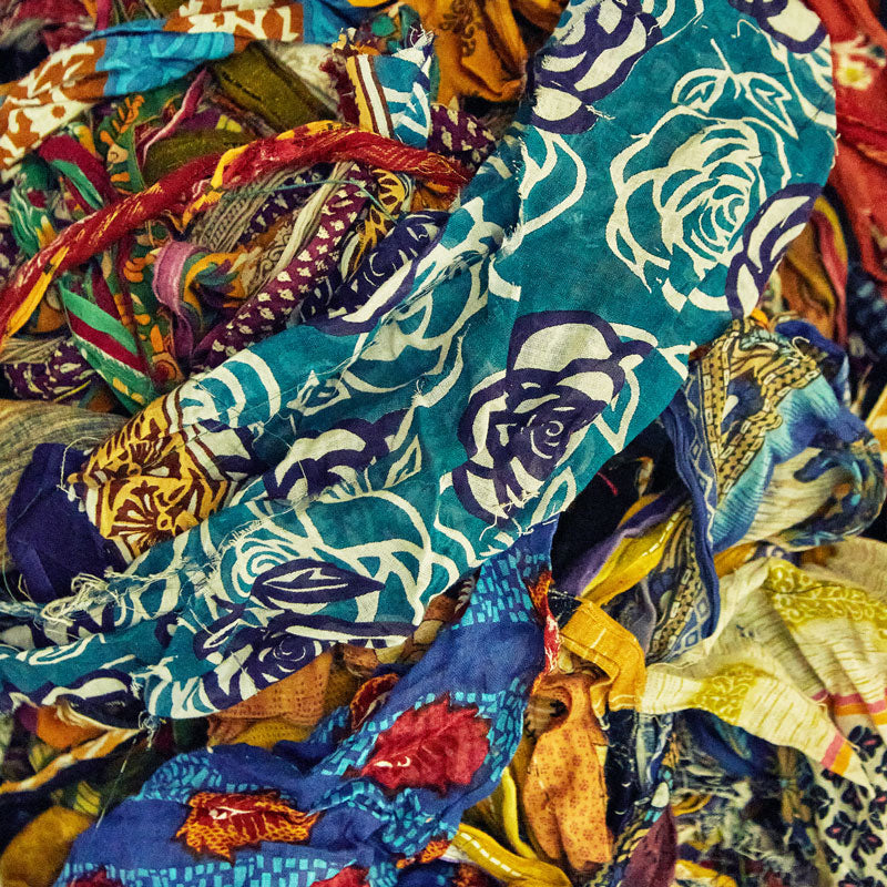 colorful vintage sari fabric scraps to be made into hair accessories ensuring zero waste