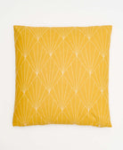 mustard yellow throw pillow with white kantha embroidery in a fan pattern