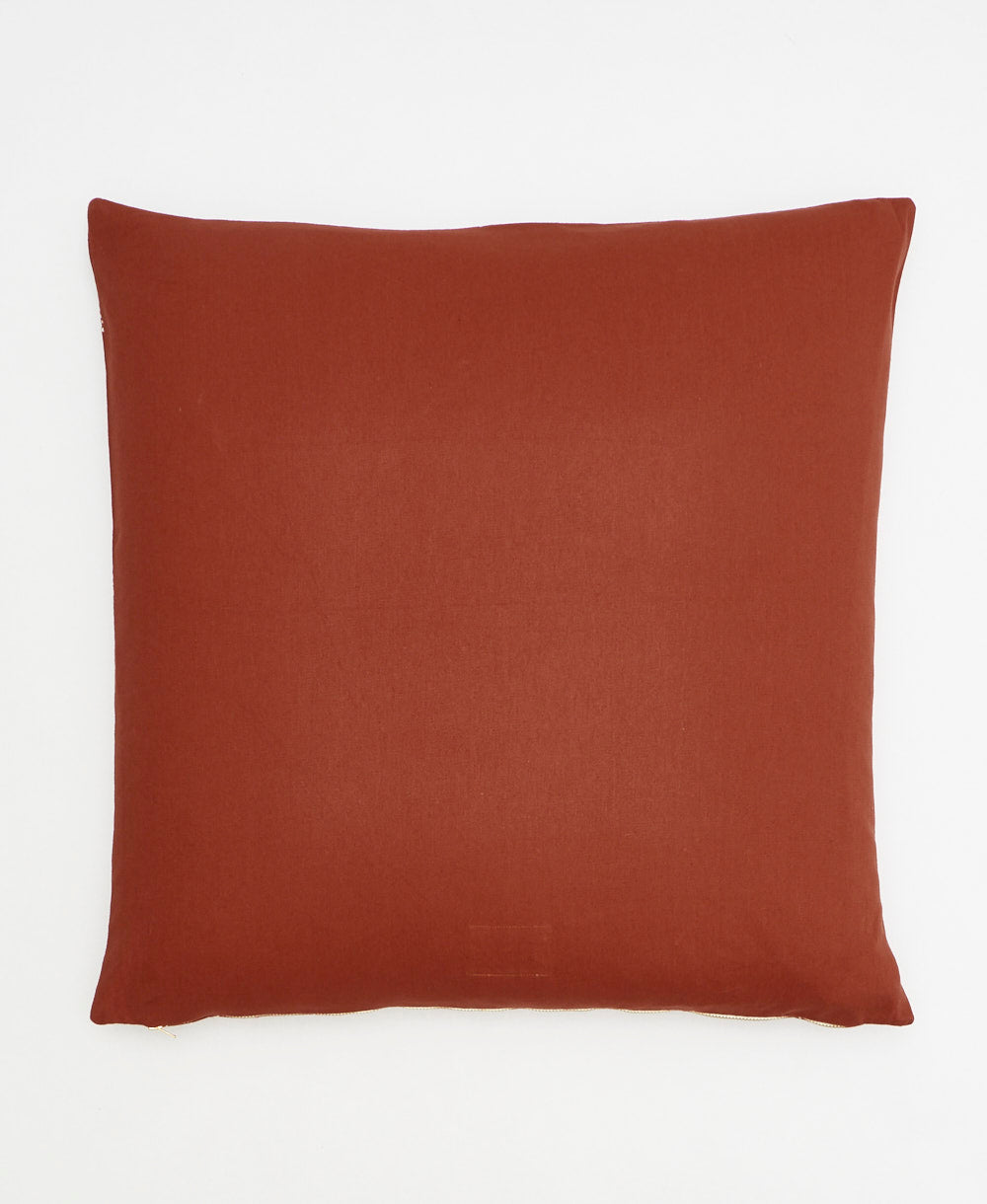 square pillow in rust red/burnt orange made from 100% organic cotton & low-impact dyes