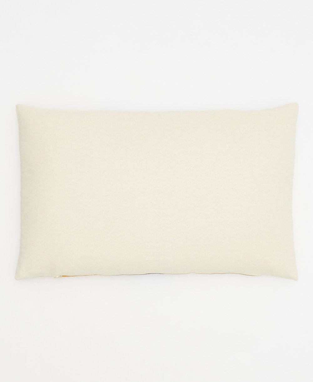 back of colorblock lumbar pillow made of 100% organic cotton & non-toxic dyes