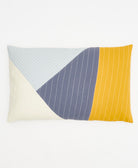 colorblock lumbar throw pillow in shades of mustard yellow, slate blue and light blue