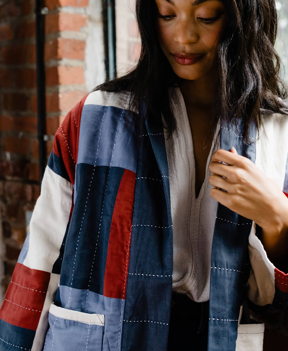 cardigan jacket made from organic cotton in patchwork colors of red, white and blue