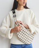 modern grid print sling crossbody bag made from organic cotton by Anchal in India