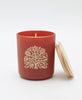 red glass candle with maple wood lid in mandarin and chili pepper scent by Anchal