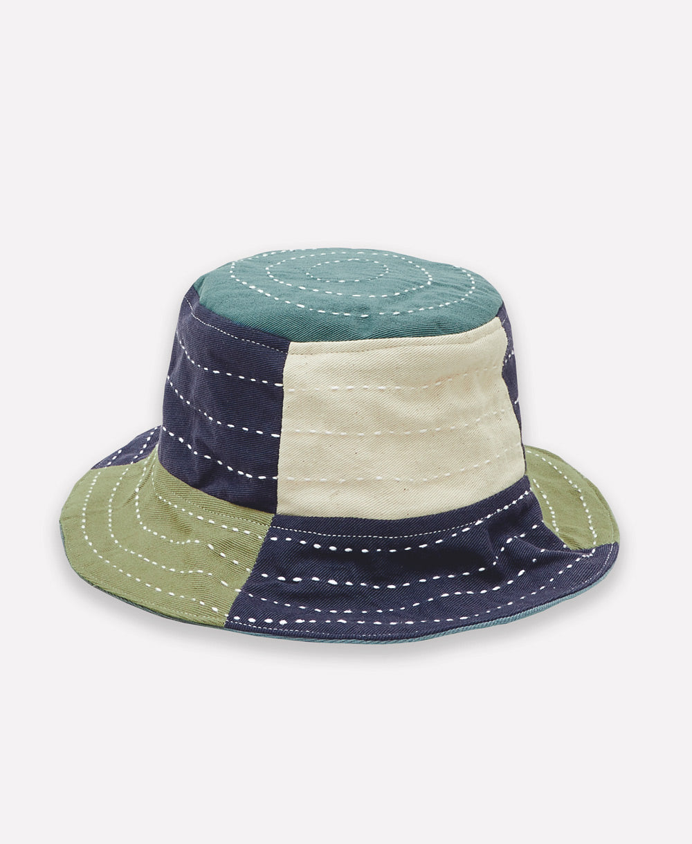 blue and green baby bucket hat in checkered design with hand-stitched embroidery made from organic cotton in India