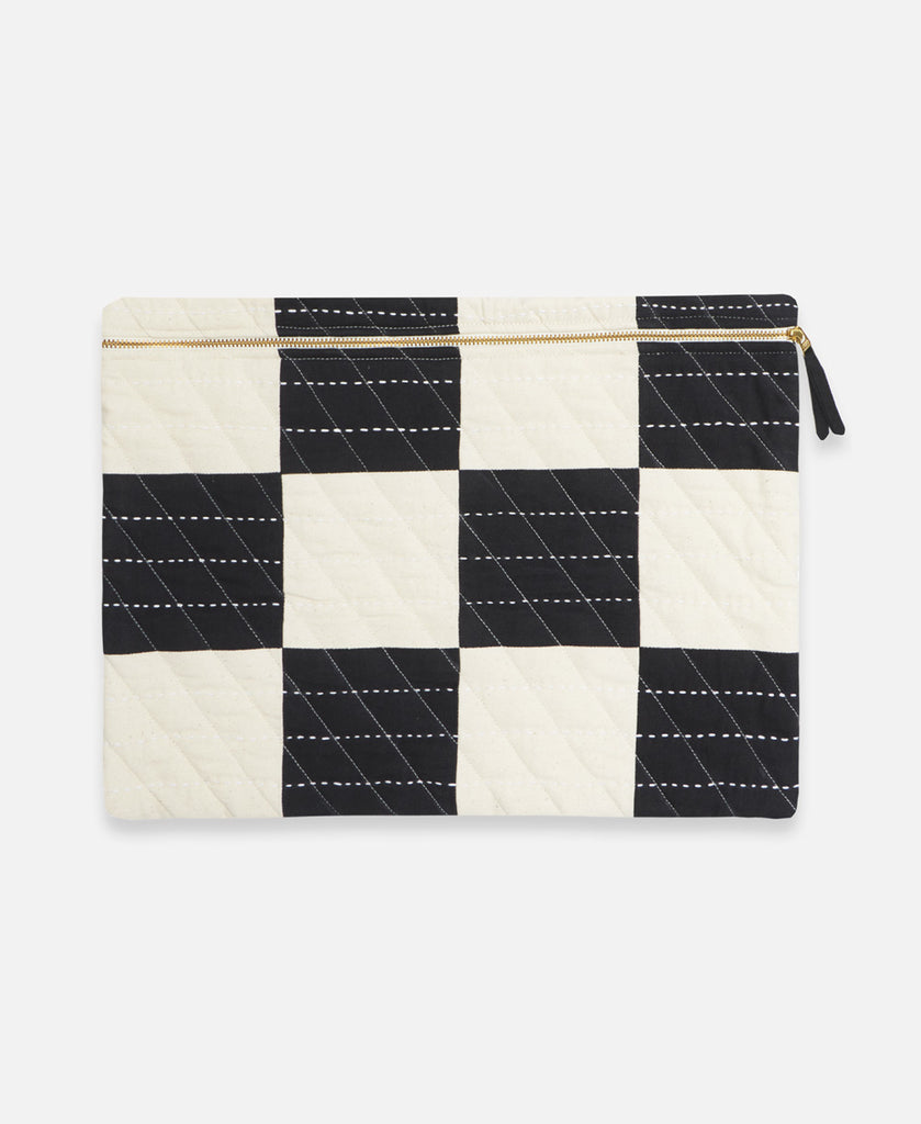 black and white checkered laptop case with zipper closure and padding