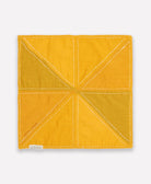 back of colorblock bandana bib in solid mustard yellow with white kantha stitching by Anchal