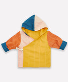 colorful wrap front toddler hoodie in pink, orange, mustard yellow, and cobalt blue handmade by artisans in India