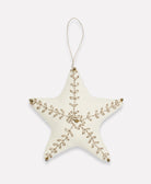 handmade cotton star ornament in ivory with gold embroidery and gold beads